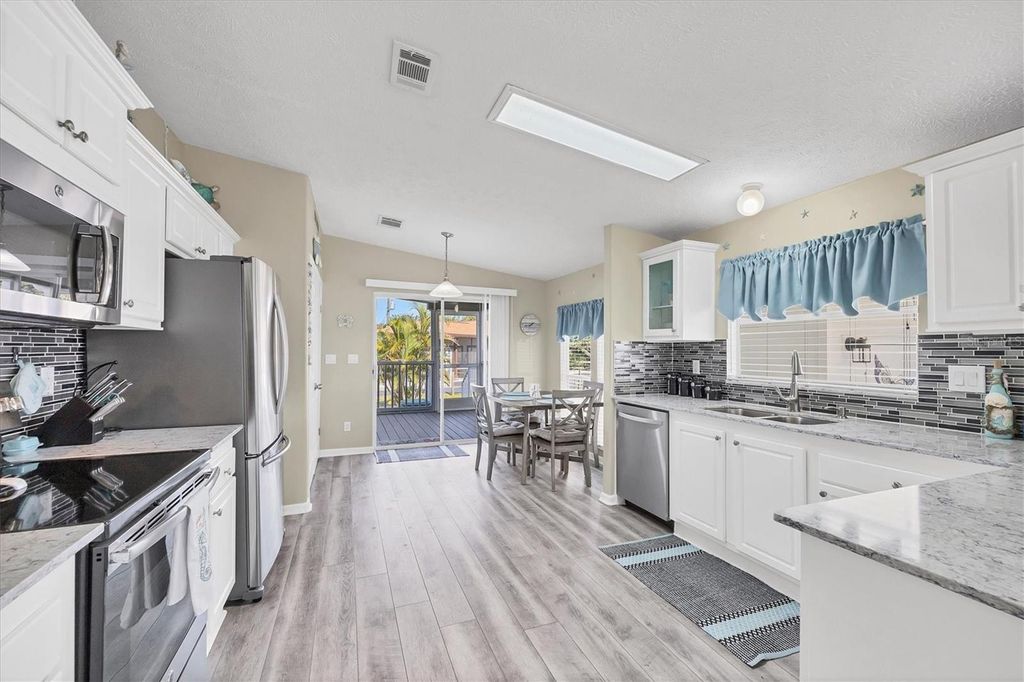 Photo of 9086 Pinehaven Way, Englewood, FL 34224 (MLS # D6144723)