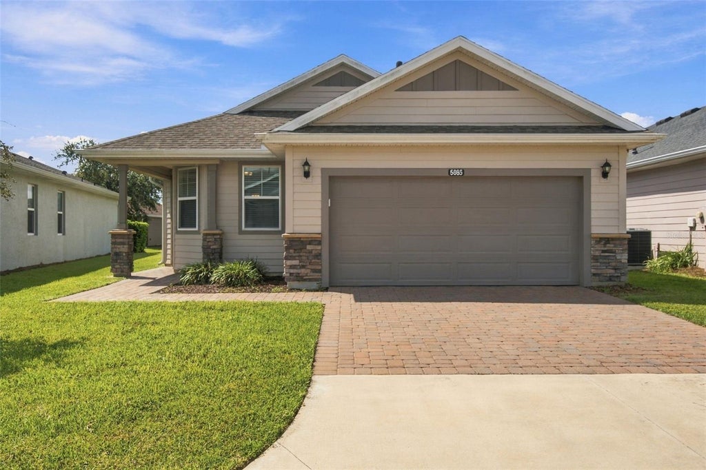 Photo of 5665 NW 40th Loop, Ocala, FL 34482 (MLS # O6442732)