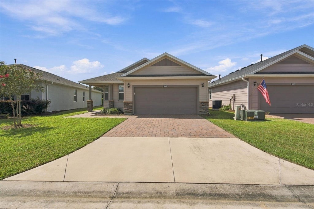 Photo of 5665 NW 40th Loop, Ocala, FL 34482 (MLS # O6442732)