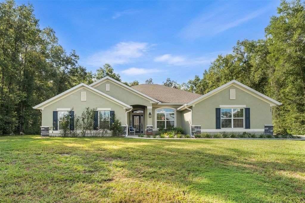 Photo of 560 NW 113th Circle, Ocala, FL 34482 (MLS # OM710233)