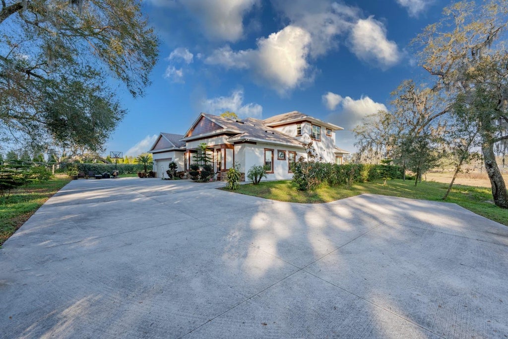 Photo of 9606 Ripley Road, Thonotosassa, FL 33592 (MLS # TB8543420)