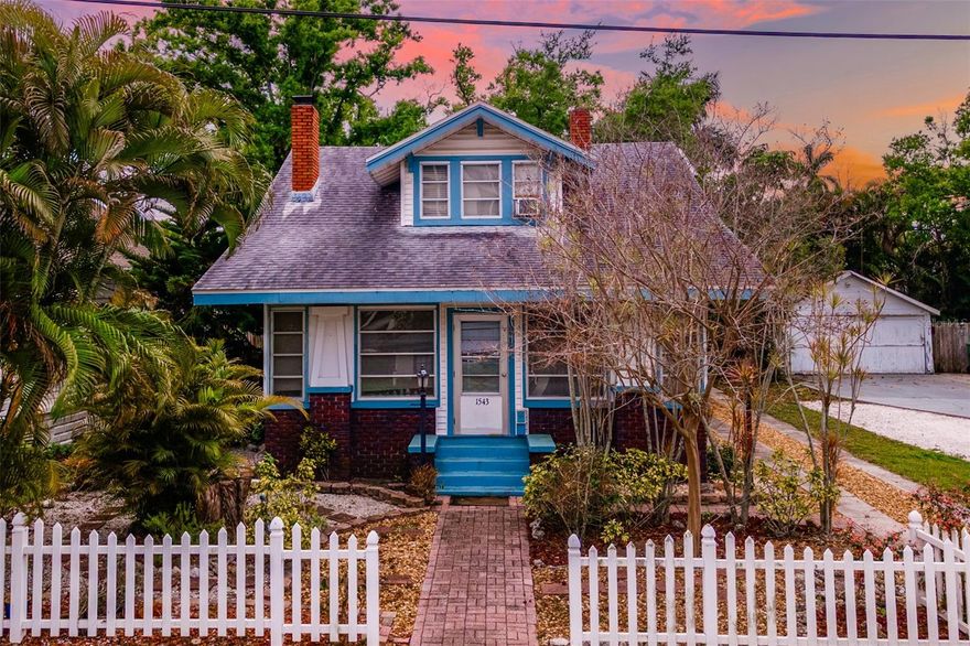 Step into the charm and character of this 1929 Bradenton home, rich with original architectural details and timeless appeal. An oversized foyer welcomes you into the main living space, where a brick wood burning fireplace creates a warm focal point. A beautiful wooden colonnade gracefully separates the living and dining areas, showcasing craftsmanship rarely found in modern homes.

This property offers a unique opportunity to restore and enhance a historic residence while preserving its classic design and solid structure.

The home does require significant TLC, making it ideal for investors, renovators, or buyers with vision who appreciate historic homes and the value of thoughtful restoration.

Adding to the property's potential is a detached garage with a storage loft above. This versatile structure could remain a functional workshop or garage, or with the right improvements could be transformed into a guest suite, studio, or future mother in law space.

Located just minutes from downtown Bradenton, the Village of the Arts, dining, shopping, and Gulf beaches, this property combines location, character, and opportunity in one distinctive offering.