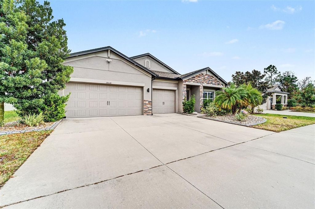 Photo of 18016 Cortes Creek Boulevard, Spring Hill, FL 34610 (MLS # TB8468694)