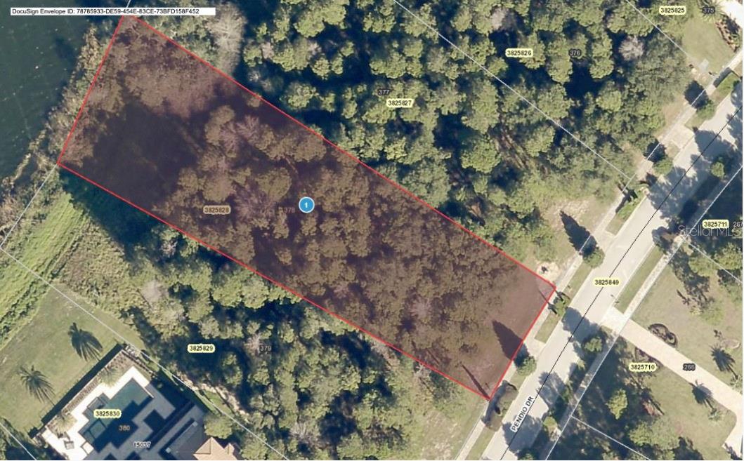 This exclusive lot backs onto one of Florida’s natural treasures – the fourth-largest lake in the state. Build your dream home on this private, wooded homesite in the unique gated community of Bella Collina. With a southeast-facing view of the lake, this lot is surrounded by beautiful oak trees, offering maximum privacy for your outdoor living space and pool—the perfect setting to entertain family and friends. This is one of the rare homesites located on a one-way street with no rear neighbors, providing additional privacy and convenient access to the exclusive second gated entrance for owners. With seven custom builders to choose from, you have the freedom to design a home that perfectly suits your lifestyle. Enjoy the world-class clubhouse amenities, featuring an 18-hole championship golf course designed by Nick Faldo, a luxurious spa, multiple dining venues, an outdoor pool complex, Har-Tru tennis and pickleball courts, and a state-of-the-art fitness center offering complimentary classes. Schedule a tour today and experience the unparalleled lifestyle that describes Bella Collina.