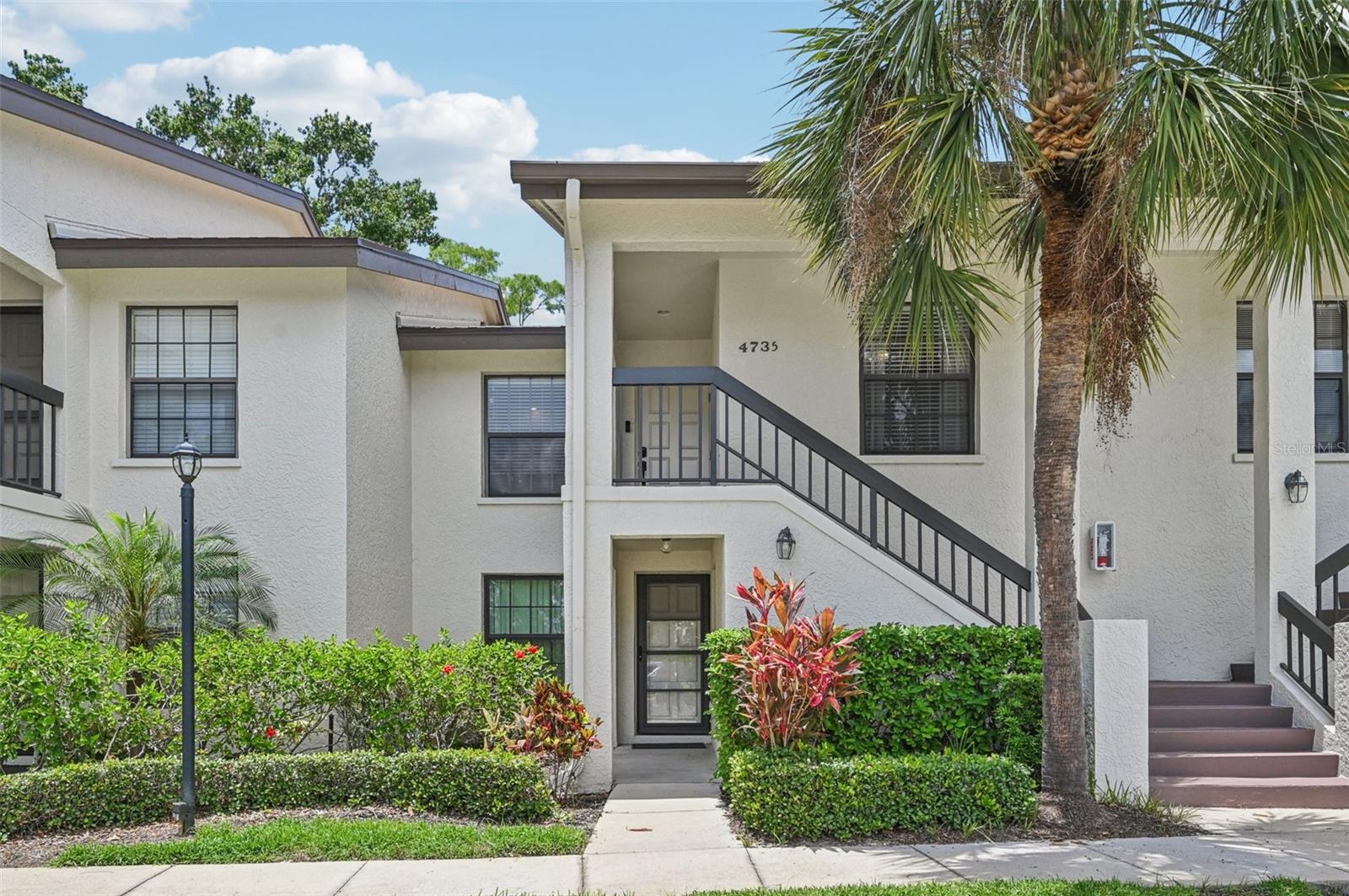 Welcome to 4735 Winslow Beacon, located in the highly sought-after community of Winslow Beacon in The Meadows, Sarasota, Florida! This beautifully maintained 2-bedroom, 2-bathroom condo offers a serene and private living experience with a fantastic backyard setting featuring mature trees and a tranquil pond, with the focal point being this stunning, revitalized balcony. As you walk in the front door of this 2nd-floor condo, you can see straight through to the sliding glass door to the lush backyard. To the right, you will find the secondary bedroom and bath; both are of great size, and the bedroom closet has plenty of space. To the left, you see the generous kitchen with newer appliances, loads of workspace, and a beautiful breakfast bar. Moving forward, you have a dining area and the living room that quickly flows towards the sliding glass doors. To the right of the living room, you find the main bedroom. This spacious room provides ample space for your bedroom suite and seamlessly flows into the primary bathroom and oversized closet, plus a wonderful view of the patio with your own private entrance. Call today for your private and exclusive showing!