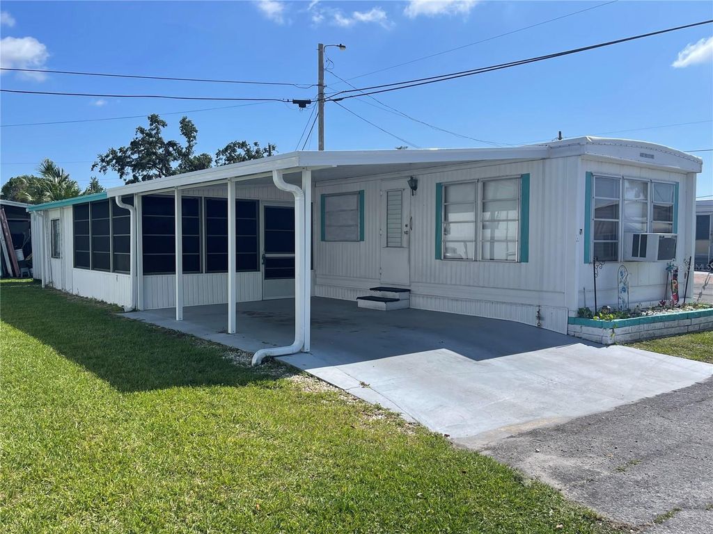 Photo of 267 Melody Lane, Palmetto, FL 34221 (MLS # A4653000)