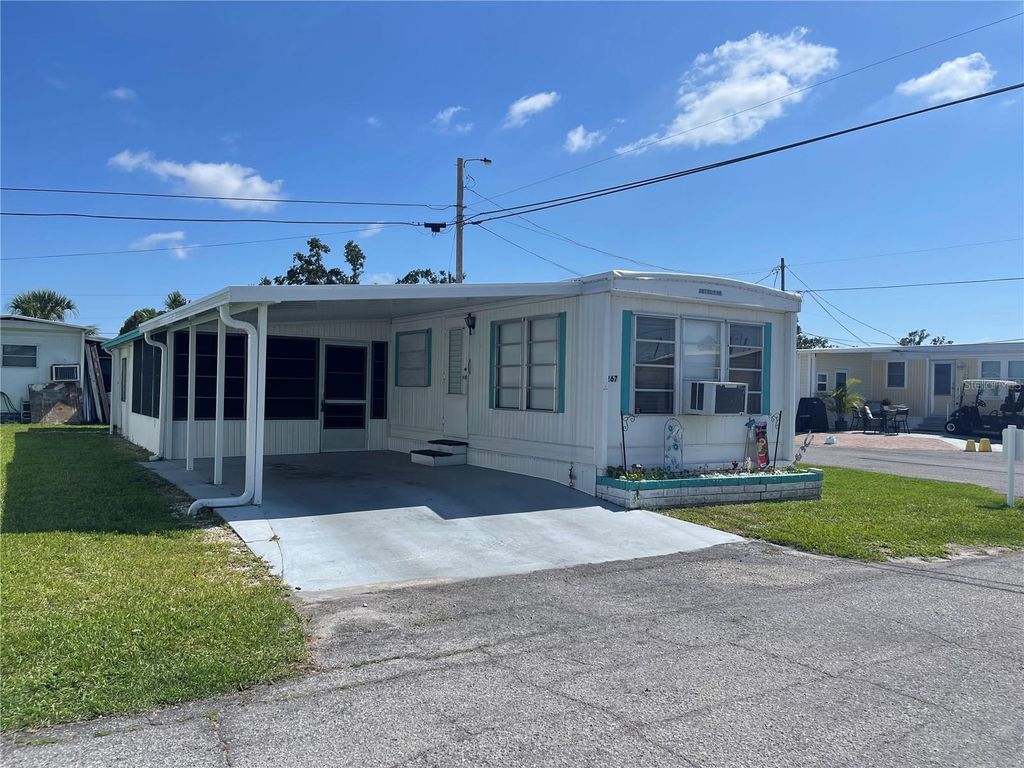 Photo of 267 Melody Lane, Palmetto, FL 34221 (MLS # A4653000)