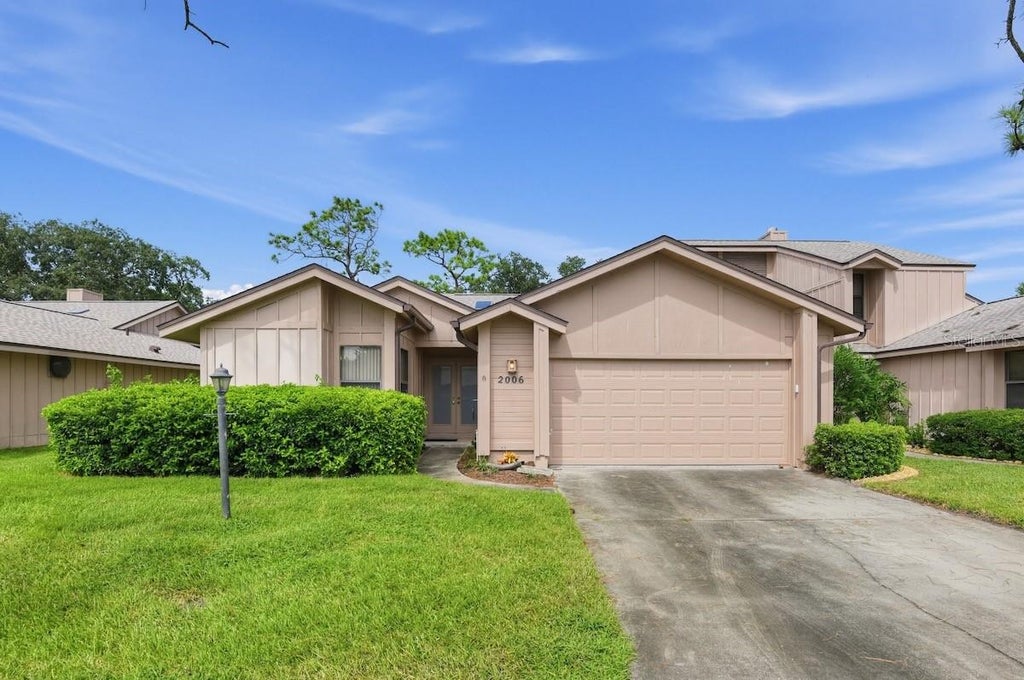 Photo of 2006 Teakwood Lane, Port Orange, FL 32128 (MLS # O6447663)