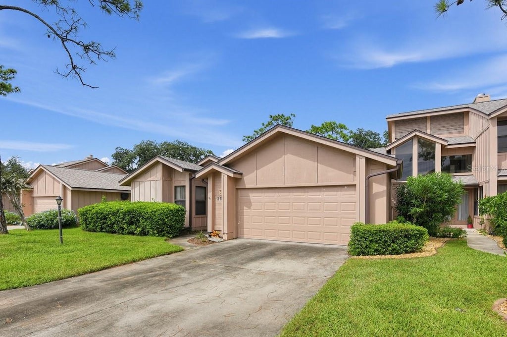 Photo of 2006 Teakwood Lane, Port Orange, FL 32128 (MLS # O6447663)