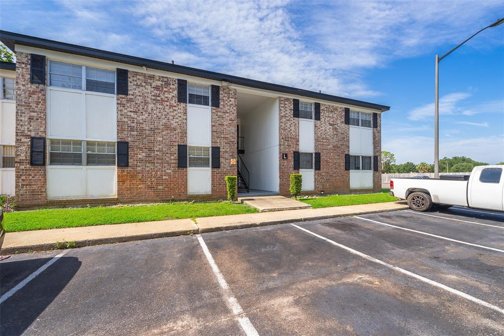 Photo of 5317 Curry Ford Road #L208, Orlando, FL 32812 (MLS # R4911955)