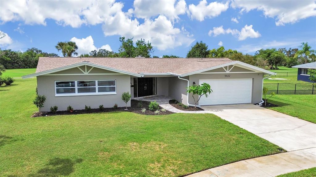 Photo of 9022 St Andrews Drive, Seminole, FL 33777 (MLS # TB8430946)