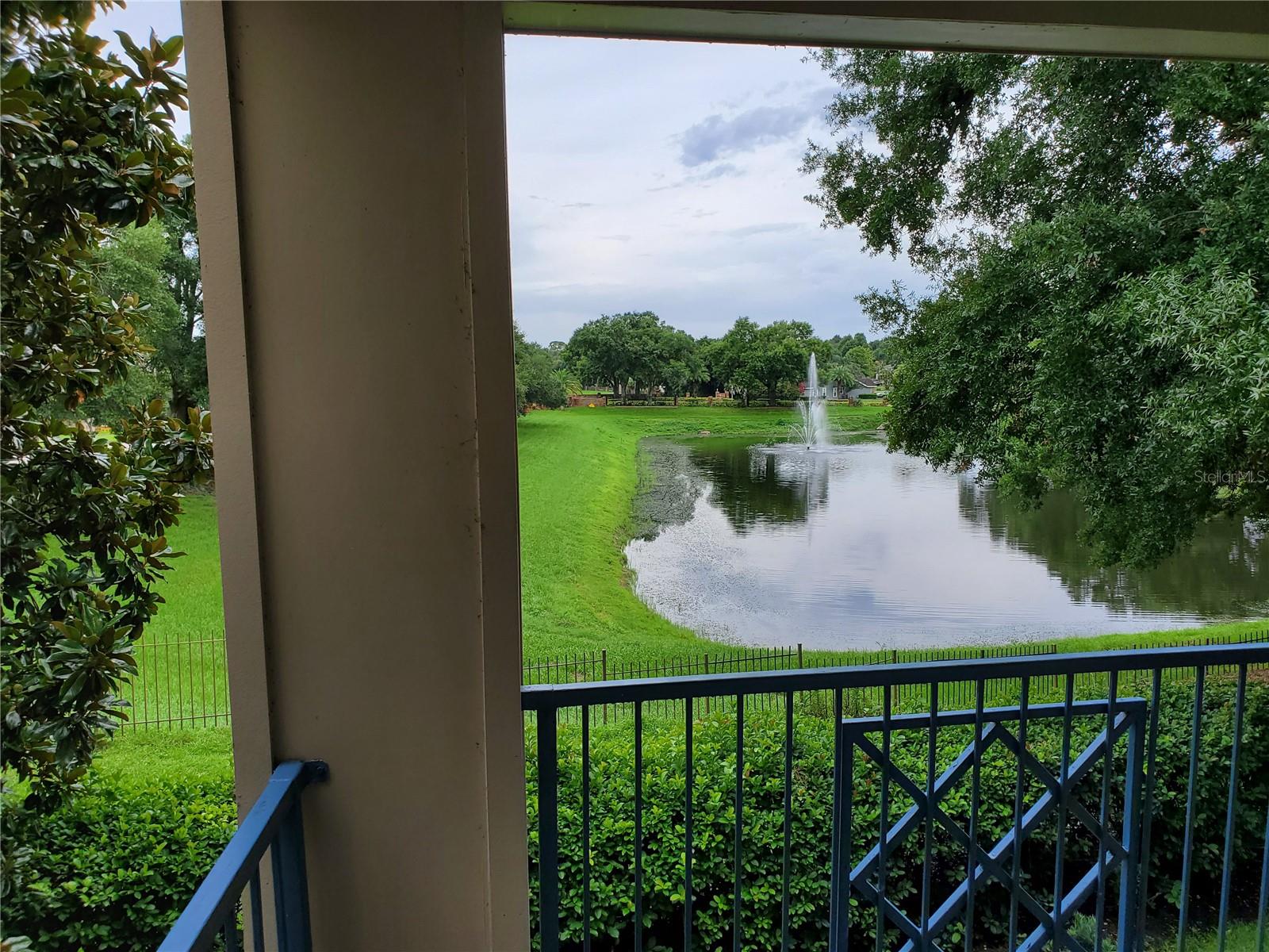 INVESTOR ALERT! Turn-key 2 bed/2 bath condo in the highly desirable Bermuda Dunes at MetroWest. This spacious unit features an open floor plan with split bedrooms with walk-in closets, interior laundry, and a PRIVATE BALCONY. Relax on the covered porch with a peaceful WATER VIEW and green space. Enjoy peace of mind with a NEW AC (2025) and steady rental income—property is LEASED THROUGH DECEMBER 31, 2026 to a reliable long-term tenant. Bermuda Dunes is a resort-style gated community offering a POOL, fitness center, tennis, volleyball, clubhouse, and more. PRIME LOCATION near Universal Studios, Valencia College, Mall at Millenia, International Drive, and easy access to I-4, Turnpike, and 408. This is the perfect low-maintenance investment in a high-demand rental market.