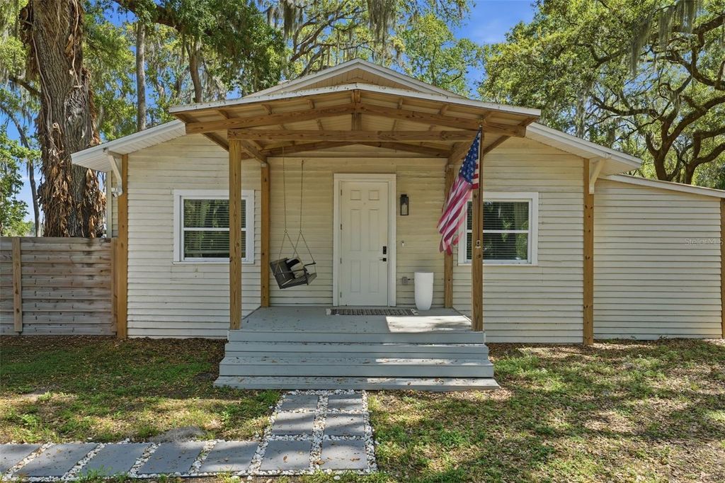 Photo of 36104 Emeralda Avenue, Leesburg, FL 34788 (MLS # OM720565)
