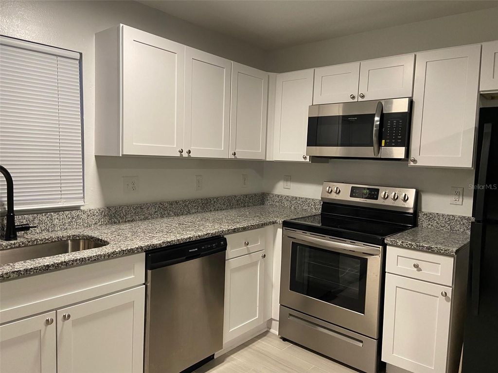 Photo of 12419 Lamont Avenue, New Port Richey, FL 34654 (MLS # W7876679)