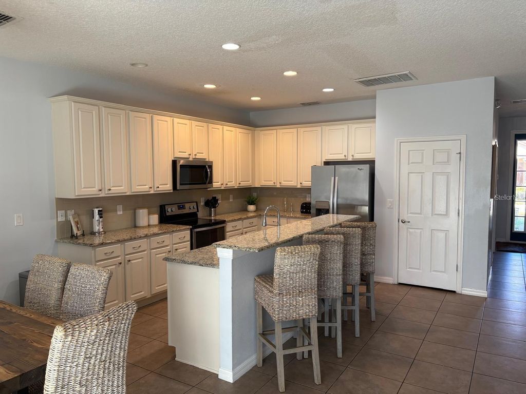 Photo of 4445 Shiva Loop, Kissimmee, FL 34746 (MLS # O6366123)