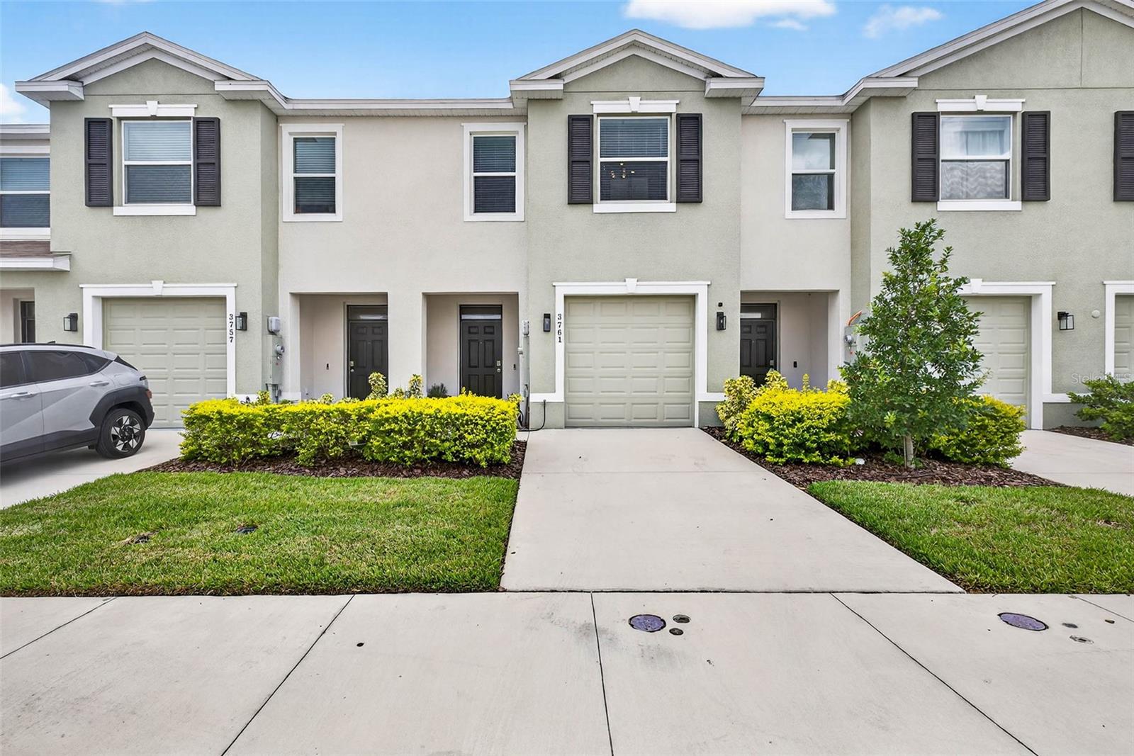 Welcome to this beautifully upgraded 3 bedroom, 2.5 bathroom townhome with a 1-car garage, located in the desirable Westwood Community. Step inside through a wide entry foyer that opens to an inviting floor plan with ceramic tile flooring downstairs and brand-new vinyl flooring upstairs no carpet throughout. The modern kitchen features stainless steel appliances, granite countertops, and elegant cabinetry, complemented by a spacious island with bar seating perfect for entertaining. Sliding glass doors from the family room lead to a fully screened lanai with an outdoor ceiling fan, where you can relax and enjoy the peaceful preserve views with no rear neighbors! Upstairs, you'll find three generously sized bedrooms, including a luxurious master suite with two walk-in closets. Each bathroom is finished with sleek granite vanity sinks. Additional upgrades include new light fixtures throughout, newer front load in-home washer and dryer, and an EV charger conveniently located in the garage. As a resident of Westwood, you'll enjoy access to resort-style amenities, including a sparkling pool with cabana, dog park, basketball court, playground, paved trails, and beautiful nature views. This prime location offers easy access to Veterans Expressway, Suncoast Trail, shopping, dining, and entertainment, making daily living both convenient and enjoyable. Don't miss the opportunity to call this upgraded townhome your next home! Home is rented unfurnished and available for move-in starting September 5th.