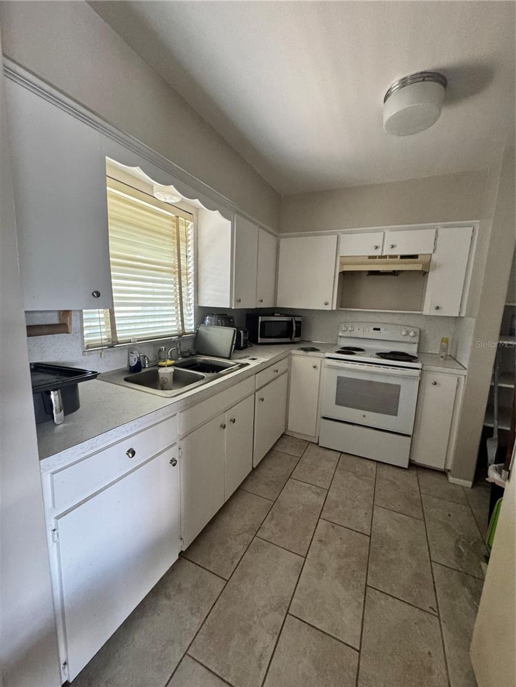 Photo of 1007 Florida Avenue #202, Saint Cloud, FL 34769 (MLS # O6356947)