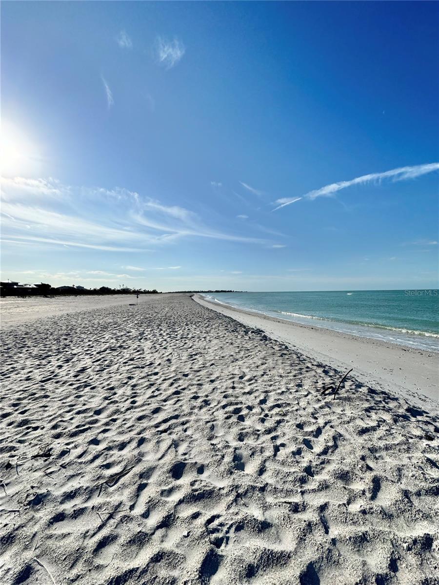 Island Paradise Awaits! Escape to Little Gasparilla Island and experience the ultimate beachfront lifestyle in this beautifully updated 2-bed, 2-bath split-level condo in Hideaway Bay Beach Club. Featuring a spiral staircase to the upstairs with views of the Gulf, the community is a barrier island with ferry access only. So no cars are on this island! The community has a pool and small clubhouse. This is where you come to disconnect from the world!
The recently renovated kitchen boasts new cabinets and countertops, perfect for whipping up island-inspired meals. Enjoy easy-care tile flooring on the first level and luxury vinyl plank upstairs. You also have two bathrooms on each level. This condo comes TURNKEY furnished and has been a rental for 7+ years, making it an excellent investment or private getaway.
Explore the island with your included golf cart, and take advantage of covered parking beneath the unit. With pristine white sand beaches just steps away, this is your chance to own a slice of paradise on the emerald green Gulf waters. Don’t miss out—schedule your private tour today!