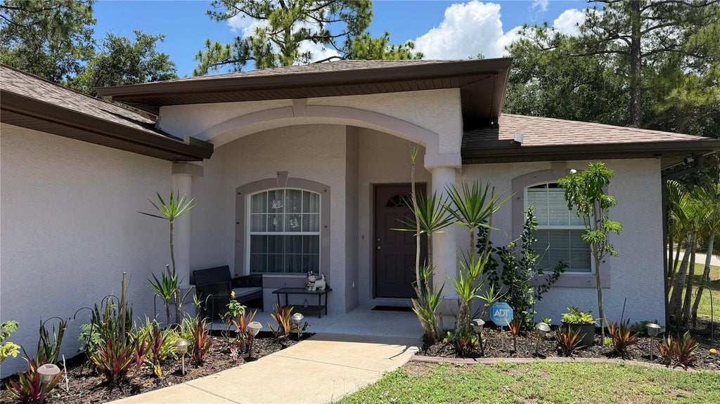 Photo of 2204 Sparkle Lane, North Port, FL 34286 (MLS # A4695771)