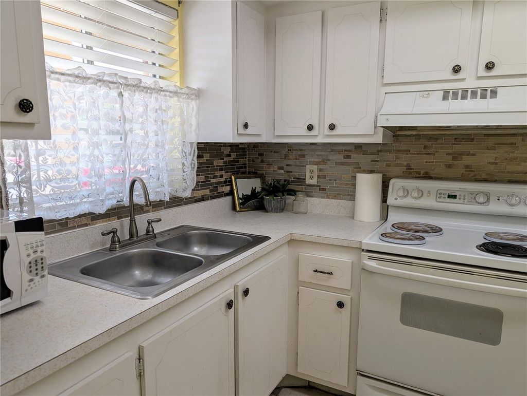 Photo of 4111 Heron Way #E-103, Bradenton, FL 34205 (MLS # A4692468)