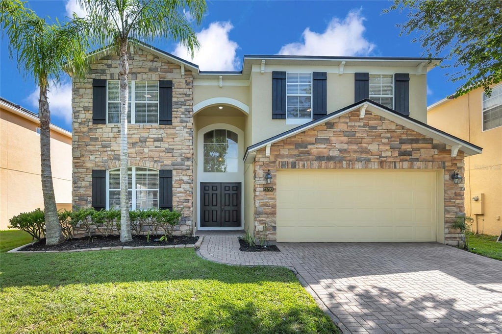 Photo of 12703 Moss Park Ridge Drive, Orlando, FL 32832 (MLS # S5158827)