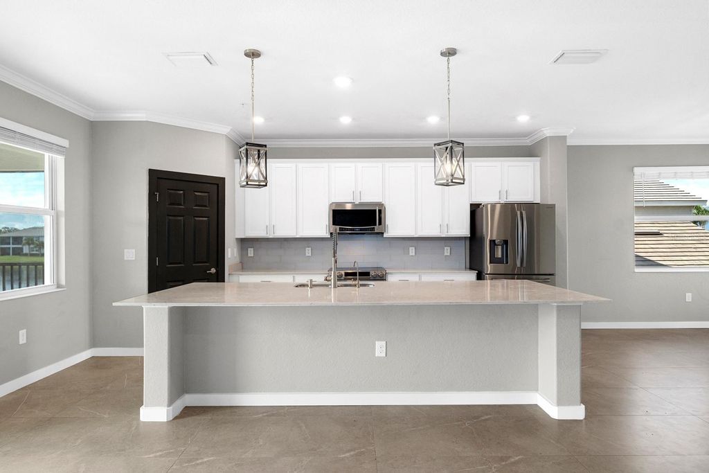 Photo of 933 Tidewater Shores Loop #722, Bradenton, FL 34208 (MLS # TB8413802)