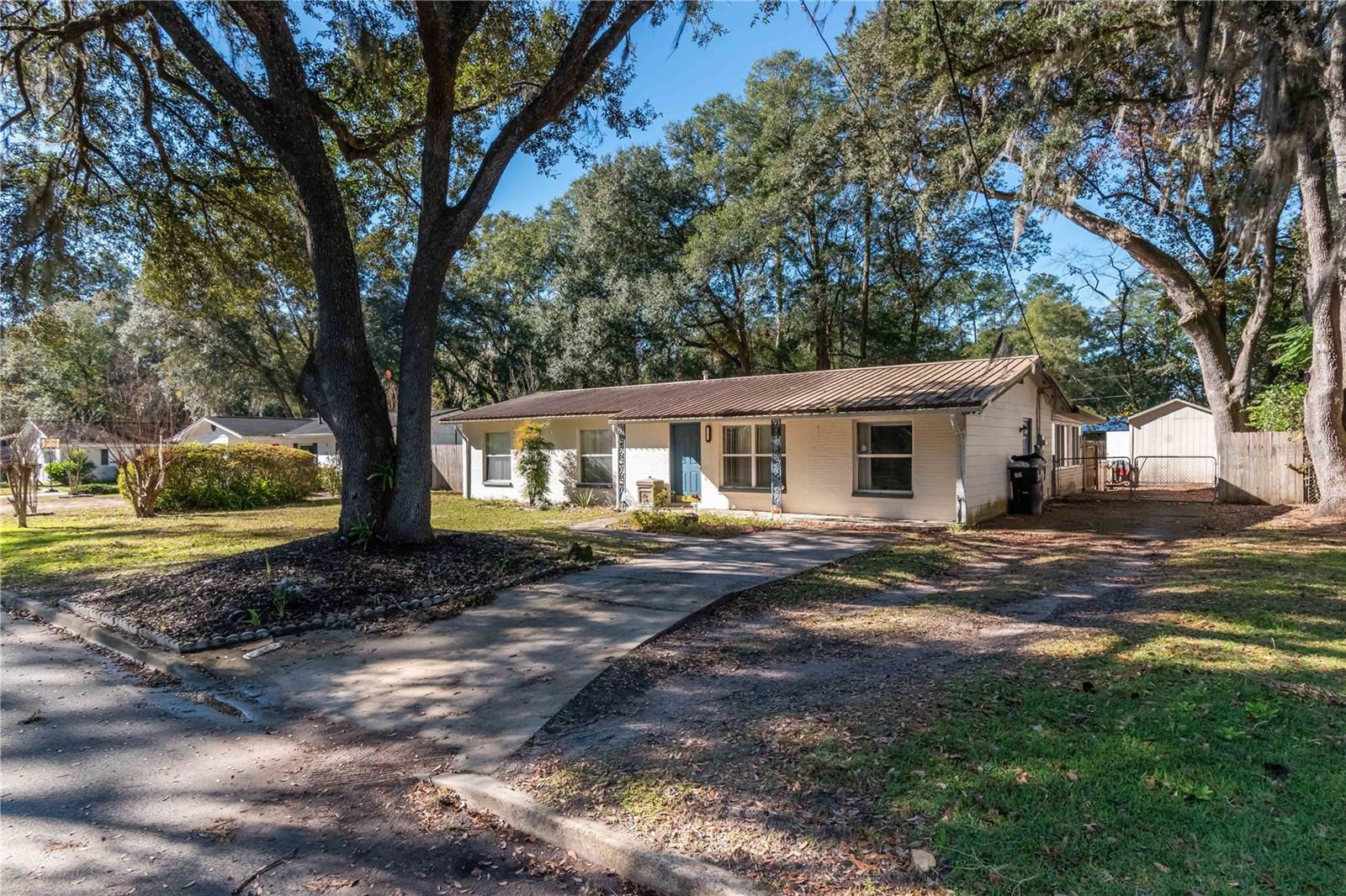 Short Sale. SHORT SALE! Beautifully renovated NW Gainesville home! Located in the HOA free community of Northwood, a block over from the Springtree park and walking trails. Complete with 4 bedrooms, 2 bathrooms and a 550 sq ft bonus room- this home has plenty of room for the whole family. Featuring new plumbing and electrical, newer appliances, a renovated kitchen, paint and so much more. Outside you will find a spacious yard with two storage sheds, 1 with power. Plenty of room for the kids, pets, and space to park a boat! Schedule your showing today. SOLD AS IS