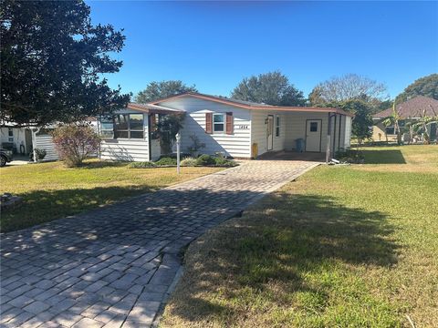 1404 PLANTATION DRIVE 9 LADY LAKE FL 32159