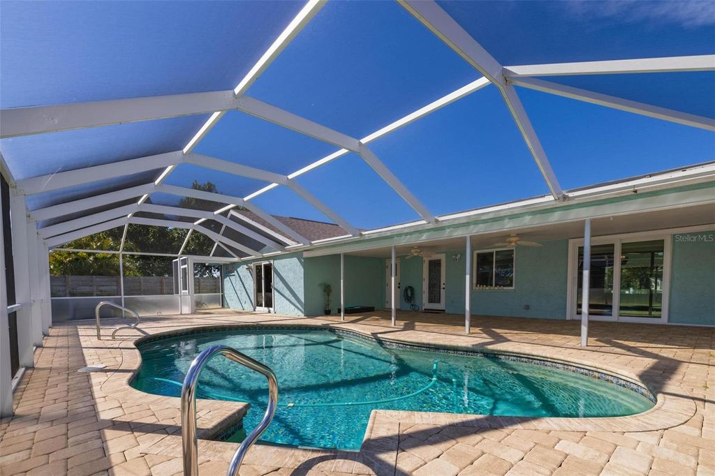 Photo of 3125 SE 22nd Avenue, Cape Coral, FL 33904 (MLS # A4639952)