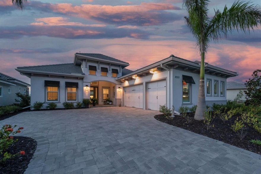 Immediate Golf Membership available to the new owners. Elevate Your Lifestyle in this exquisite Mayfield 3 Stock home, nestled within the prestigious community of The Lake Club. This stunning residence is perfectly situated on an expansive water homesite, providing a captivating backdrop for your living experience. As you step inside, the open floor plan invites you to embrace a lifestyle of seamless entertaining, where every detail reflects your unique taste and preferences. The kitchen is a culinary enthusiast's dream, featuring custom cabinets with convenient pullout drawers, a reverse osmosis water filtration system, a water softener, and a gas cooktop. The focal point is a floating island adorned with quartz countertops and complemented by chic pendant lighting. Stainless steel appliances, a designer backsplash, and a cozy eat-in breakfast area complete this gourmet haven. For those who work from home or simply desire a private space, an office with built-in cabinetry and a closet awaits. A separate dining area adds a touch of sophistication, perfect for intimate gatherings. The generous great room adjacent to the kitchen boasts a dry bar with built-in cabinetry and a wine refrigerator, enhancing your entertaining options. Slide open the pocket doors to reveal the fabulous lanai, where you'll find a captivating saltwater pool with a spa, an outdoor kitchen with a vented hood, and a panoramic picture-size lanai with a no-see-um screen, allowing you to fully immerse yourself in the stunning water views. This home also offers the convenience of remote-controlled hurricane screen protection on the lanai and a mosquito-controlled system. The owner’s suite is a welcome retreat and features French doors that open onto the lanai, a freestanding large tub, dual sinks, a glass walk-in shower, and two walk-in closets with custom built-ins. The secondary bedrooms are generously sized, providing comfortable accommodations for family and guests. A well-appointed half bath caters to your guests' needs. Additional highlights of this home include a three-car garage with cabinetry, a work area, and ceiling storage, ensuring ample space for your belongings. Two twin mini-split A/C units further enhance your comfort and convenience. Thoughtful upgrades abound, including plantation shutters, hurricane impact glass, tray ceilings, designer lighting, and fans throughout the home. This residence epitomizes luxury living in one of Lakewood Ranch's premier guard-gated communities. The Lake Club offers a wealth of amenities, including a grand clubhouse with a restaurant and bar, two resort-style swimming pools, an expanded fitness center, a massage and skincare room, a gaming and lifestyle center, and various sports facilities, such as tennis, pickleball, and basketball courts. Additionally, Linear Park and interlinking lakes provide opportunities for kayaking and fishing, ensuring a lifestyle of leisure and recreation.