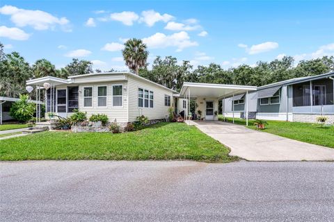 Photo of 9 Cocos Plumosa Drive #A, Eustis, FL 32726 (MLS # O6344203)
