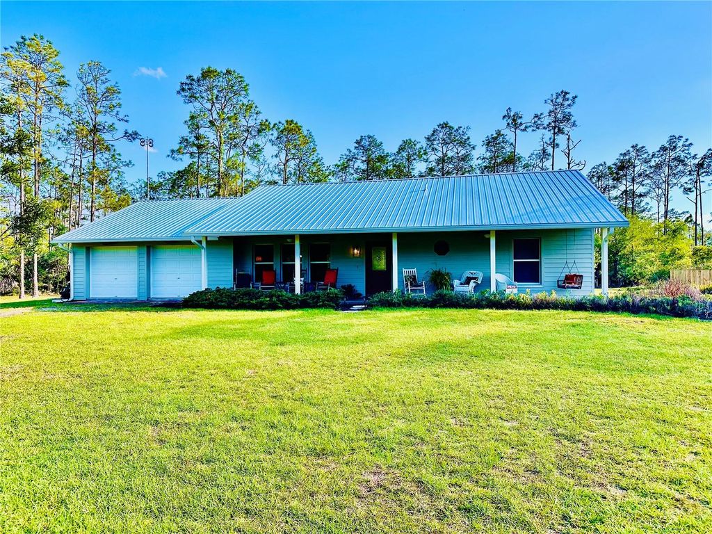 Photo of 32801 Hwy 441 N #36, Okeechobee, FL 34972 (MLS # A4692856)