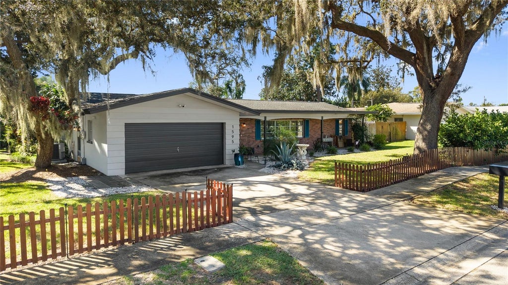 Photo of 1595 Peaceful Lane N, Largo, FL 33756 (MLS # TB8560994)