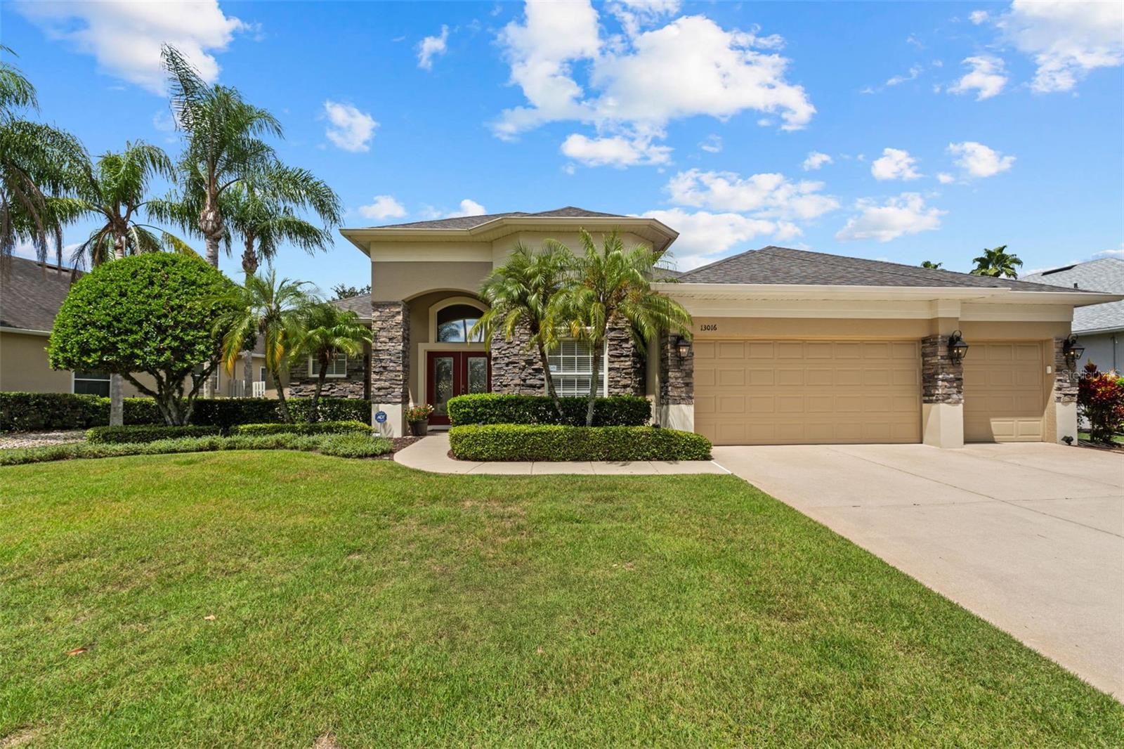 Welcome to 13016 Islamorada Dr., a stunning executive residence in the award-winning Hunters Creek community, now available at a new, reduced price. This home, which has been meticulously maintained and remains in pristine condition with no furry friends or littles ones having ever lived here, offers a rare combination of elegance and practicality. From the moment you step inside, you're greeted by tall ceilings and an impressive, unobstructed view of the sparkling pool and spa from all the main living areas, creating an immediate sense of spaciousness and tranquility.
The open-concept layout includes beautiful formal living and dining rooms, while the heart of the home—the kitchen—is a chef's delight. It boasts stainless steel appliances, solid wood cabinetry, stone countertops, and extensive storage, flowing seamlessly into the family room and breakfast nook. This home provides exceptional flexibility with four spacious bedrooms, four full bathrooms, and a dedicated office. A versatile bonus room with its own full bathroom offers the perfect opportunity for a private fifth bedroom or an in-law suite.
Step outside to your own private oasis: a screened lanai with a beautiful pool and spa, ideal for relaxation and entertaining. The oversized three-car garage and manicured landscape add to the property's appeal. Numerous updates, including a newer roof (2019) and AC (2016), ensure peace of mind. As a resident, you'll also enjoy Hunters Creek's incredible amenities, including seven parks, sports courts, and top-rated schools, all while being just minutes from major highways, a variety of restaurants, and Central Florida’s world-famous attractions.