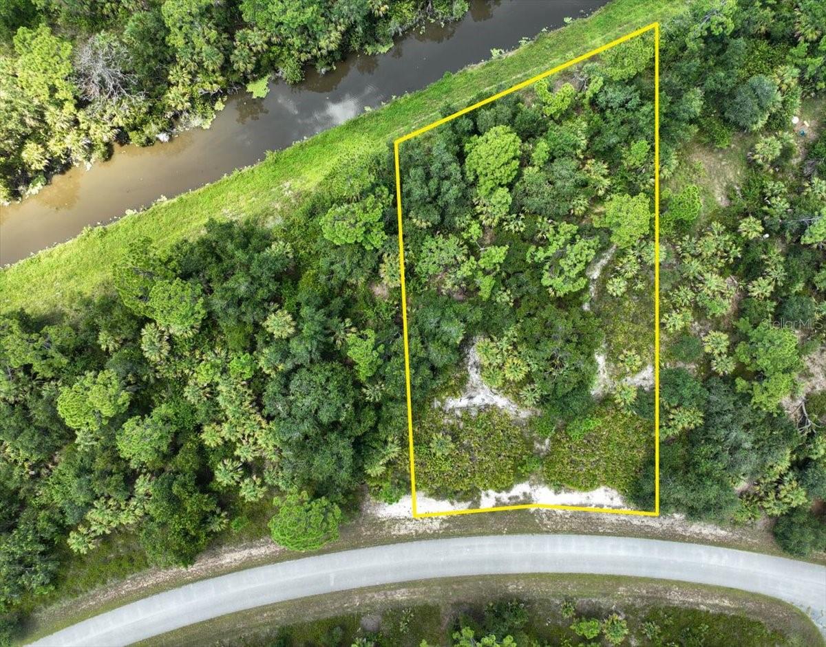 Here's your chance to own 2 oversized, adjacent freshwater canal lots being sold together, with over 210 feet of canal-frontage. With a combined 0.84 acres, these lots will allow you to design and build your ideal dream home exactly as you want it, situated on the Bethlehem Waterway. These lots are located in an X flood zone, not in an HOA and not currently (as of 8/14/25) on the North Port Identified Scrubjay Lots List, which means no HOA rules, extra insurance costs or scrub jay permit/mitigation fees. If you're not quite ready to build, this would be a great investment for self directed IRAs, 401Ks and other investment portfolios that are looking to hold property in an expanding neighborhood. Easy access to US-41 and I-75, shopping, restaurants, golf courses, fishing and more!
