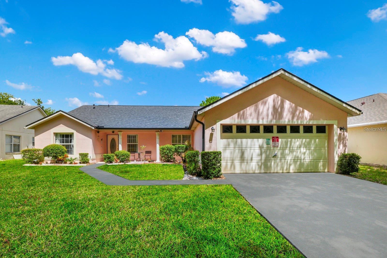 Welcome to 143 Breezy Oaks Court, Davenport, FL! This charming home offers bright, open living spaces designed for comfort and style. Enjoy a modern kitchen, spacious bedrooms, and a serene primary suite perfect for relaxation. The private backyard provides an ideal space for outdoor gatherings or quiet evenings. Located just minutes from world-class attractions, shopping, and dining, this home delivers the perfect Florida lifestyle.