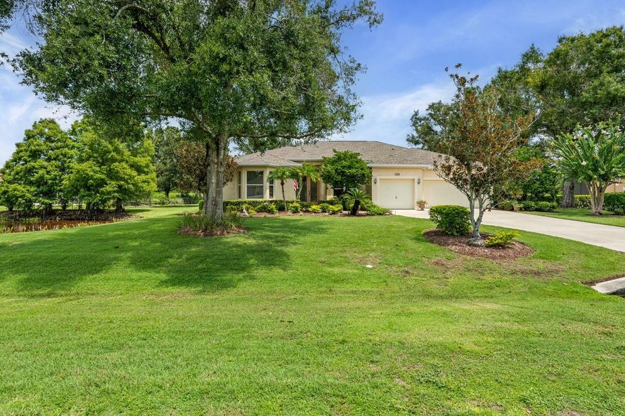 “Country Charm with Everyday Convenience”
Nestled on over an acre of beautifully manicured and mature landscaping, this custom-built Augusta model, featuring 3 bedrooms, 2 baths, and a den, offers a rare combination of elegance & comfort. The beautiful double glass front entry with matching transom windows sets the tone, opening to soaring 12-foot ceilings, refined crown molding, and an abundance of natural light. The Family room is anchored by a lovely wood-burning fireplace, while the den features Bay Window with custom built-in seating, blending functionality with architectural charm. The gourmet kitchen is the heart of the home, showcasing a granite-topped island, premium finishes, and seamless flow for both intimate gatherings and grand entertaining. The expansive master suite is a private sanctuary, complete with large walk-in closet En-suite bathroom boasting double sink vanity, frameless glass shower, roman tub, and bidet. Sliding doors allow easy access to pool deck and lots of light. Practical touches such as a well-appointed laundry room with cabinetry and a utility tub access the spacious 3 car garage equipped with workbench and extra storage. Outdoors, the property embraces Florida living at its finest. A tranquil pond, shared with a neighboring property, provides the perfect setting for fishing and quiet reflection. At the same time, the surrounding grounds attract deer, turkeys, and other wildlife, not to mention abundant butterflies in the garden, creating a private nature retreat. Golf cart accessibility enhances the lifestyle, and additional features such as New Roof installed (2021), Well Pump (2025), Hot Water Heater (2022), solar film on south facing windows, a water softener all add both efficiency and convenience. Located just 30 min. from downtown Sarasota, 20 min. to Waterside LWR, Only 11 miles from I-75, shopping & Restaurants. Convenient to both Siesta and Lido’s beautiful beaches and 15 min. from the Majestic Myakka State Park. With timeless design and serene surroundings, this home is a refined retreat where luxury meets tranquility. Schedule you showing today!