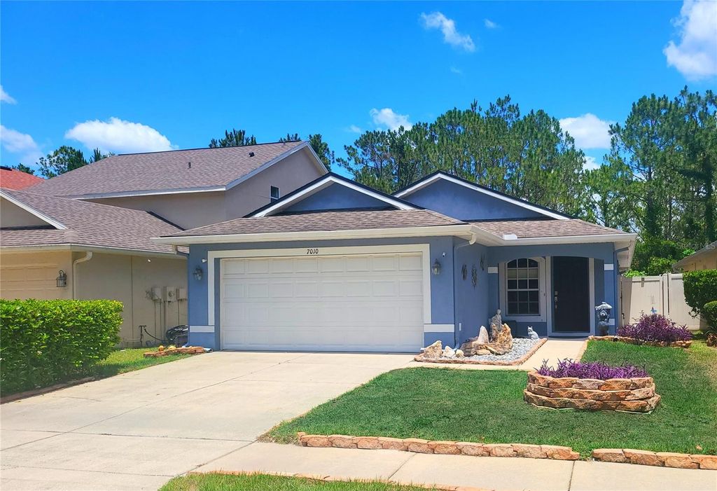 Photo of 7010 Kendall Heath Way, Land O Lakes, FL 34637 (MLS # TB8396734)