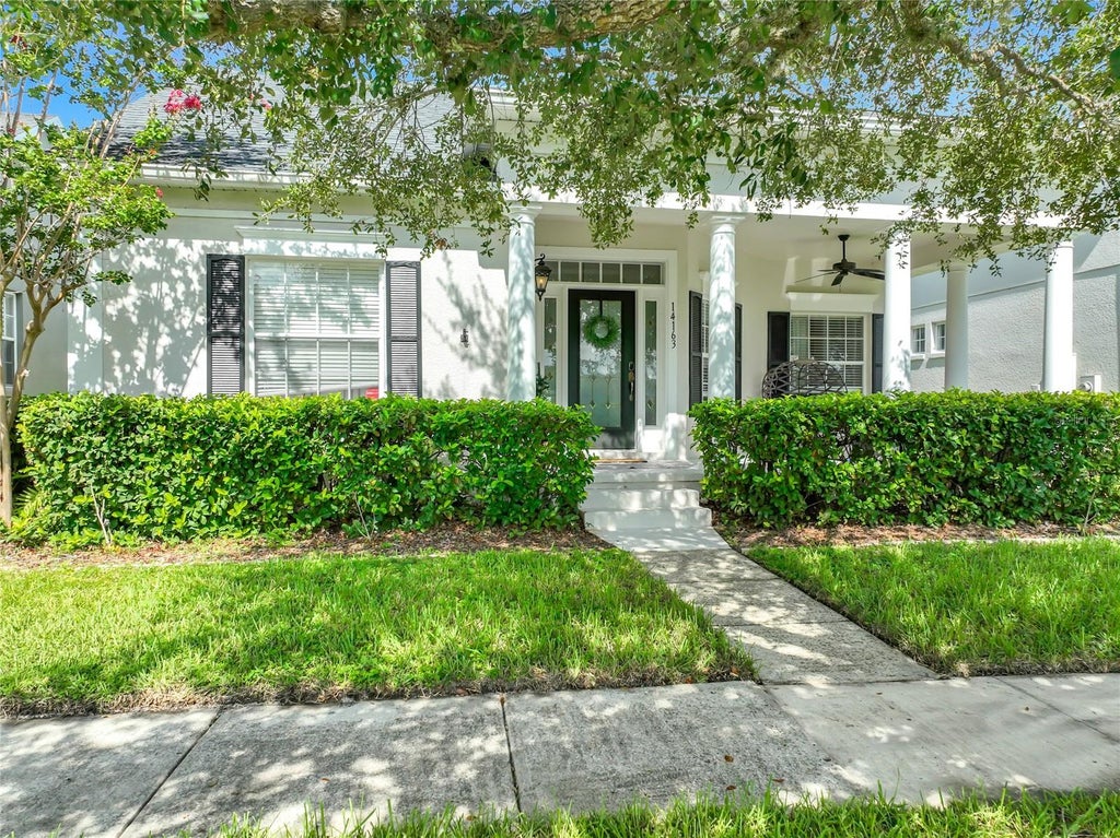 Photo of 14163 Chicora Crossing Boulevard, Orlando, FL 32828 (MLS # O6428318)