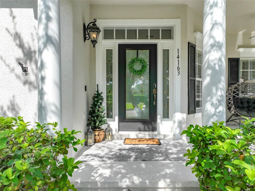 Photo of 14163 Chicora Crossing Boulevard, Orlando, FL 32828 (MLS # O6428318)