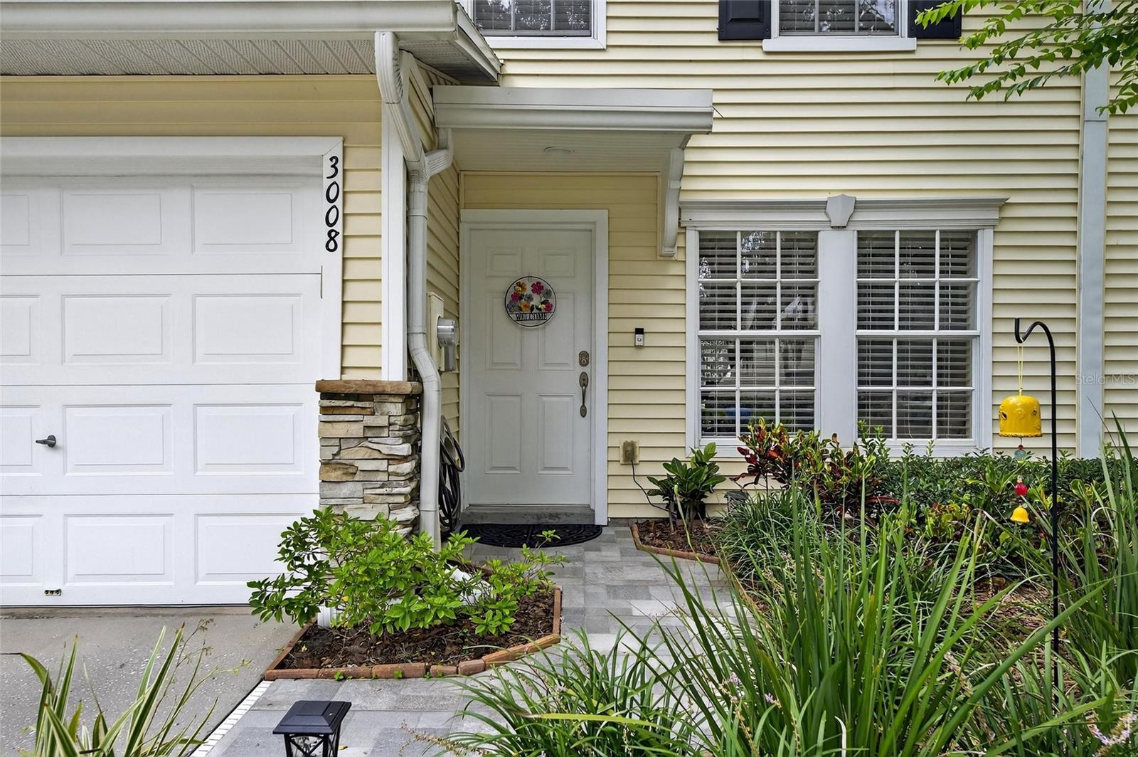 **Charming & Stylish Townhome in Valrico**
Welcome to this beautifully updated 2-bedroom, 1.5-bath townhome, offering an open and airy feel the moment you walk in. Neutral tones throughout provide the perfect backdrop for your personal style and décor. The kitchen is a true highlight, featuring granite countertops, stainless steel appliances, a tile backsplash, and crisp white cabinetry. The living and dining areas boast warm wood flooring, while the staircase features matching wood treads with stylish faux metal risers.
Upstairs, the primary suite offers a spacious walk-in closet and direct access to the full bath, complete with dual sinks, a garden tub, and a separate shower—finished with updated tile and custom details. A versatile loft space is ideal for a home office, craft area, or extra sitting room and leads to the second bedroom. Wood flooring flows throughout the second floor (except the bath), and soaring cathedral ceilings add to the spacious feel.
Additional features include an upstairs laundry closet and an extended back porch—perfect for relaxing or entertaining. Custom touches throughout make this home move-in ready and just waiting for your personal flair. Conveniently located near shopping, dining, and commuter routes, this townhome is a must-see!