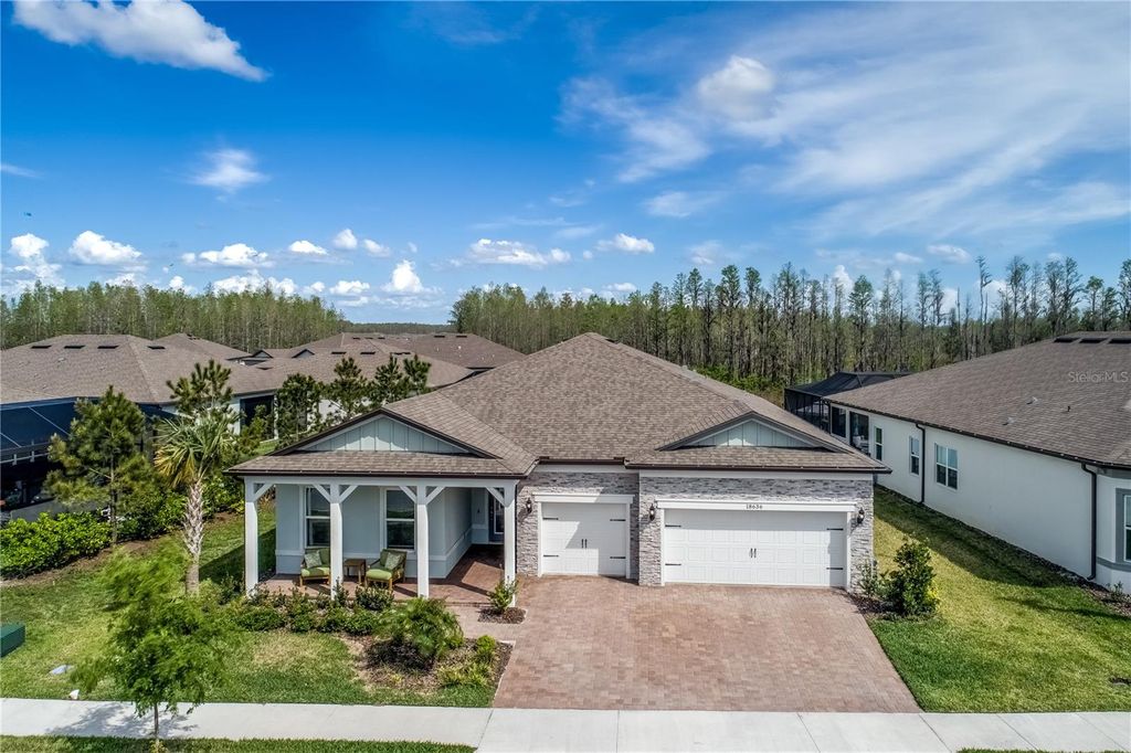 Photo of 18636 Sailors Delight Pass, Land O Lakes, FL 34638 (MLS # TB8365724)