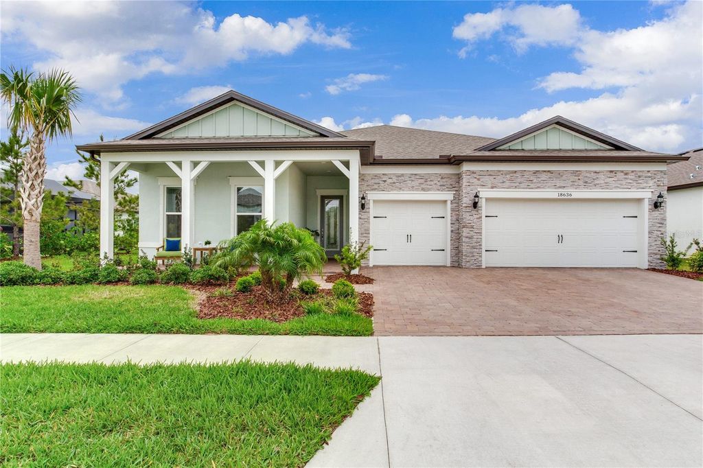 Photo of 18636 Sailors Delight Pass, Land O Lakes, FL 34638 (MLS # TB8365724)