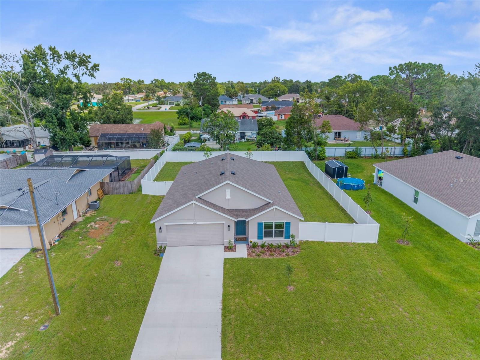 One or more photo(s) has been virtually staged. MOVE-IN-READY!! UPGRADED 4/2/2 built by D.R. HORTON in 2024!!! Like BRAND NEW...but added the fenced in backyard with NEW VINYL PRIVACY FENCE!! Beautiful upgraded and modern design!! 4-bedroom + 2-bathroom + 2 Car garage home + fenced in backyard + located in a great location close to everything!! The high ceilings and pen floor plan make this home feel light, bright, and spacious!! Everything is basically new...new roof, new AC, new appliances, new finishes...builder's warranty! NO HOA!! NO CDD!! NO FLOOD!! Zoned for Springstead High School!!
GORGEOUS kitchen with large modern island with Quartz countertops, shaker-style cabinets, stainless steel appliances! The kitchen is open to the great room and dining room and overlooks the lanai and backyard - great for family gatherings and entertaining family and friends!! Lots of windows and lets in a lot of natural light! Large fenced backyard for your pets and family to enjoy!!
DR HORTON'S DESCRIPTION ON THIS MODEL: The home offers four generously sized bedrooms. A separate wing at the front of the home houses three of the bedrooms along with a full bathroom, providing privacy and versatility for family, guests, or office space. The primary suite is tucked away for added seclusion and features a luxurious ensuite bath with a double vanity and a spacious walk-in closet. Whether you're relaxing with family, hosting guests, or working from home, this home offers the perfect balance of openness and privacy in a thoughtfully designed layout.
Minutes from shopping, restaurants, movies, schools, Buccaneer Bay Water Park, kayaking the crystal clear Weeki Wachee River, sunsets at Pine Island, boating, fishing, swimming w/the manatees. 1 hr to Tampa & TOP US BEACHES!