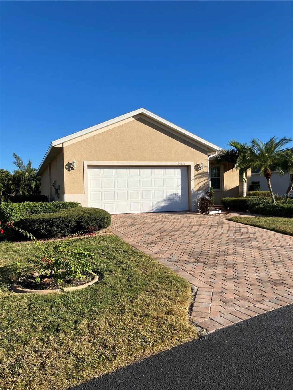 Photo of 24684 Rio Villa Lakes Circle, Punta Gorda, FL 33950 (MLS # A4672975)