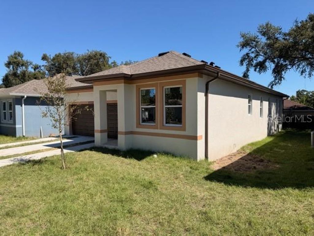 Photo of 8703 N 48th Street, Tampa, FL 33617 (MLS # TB8437131)