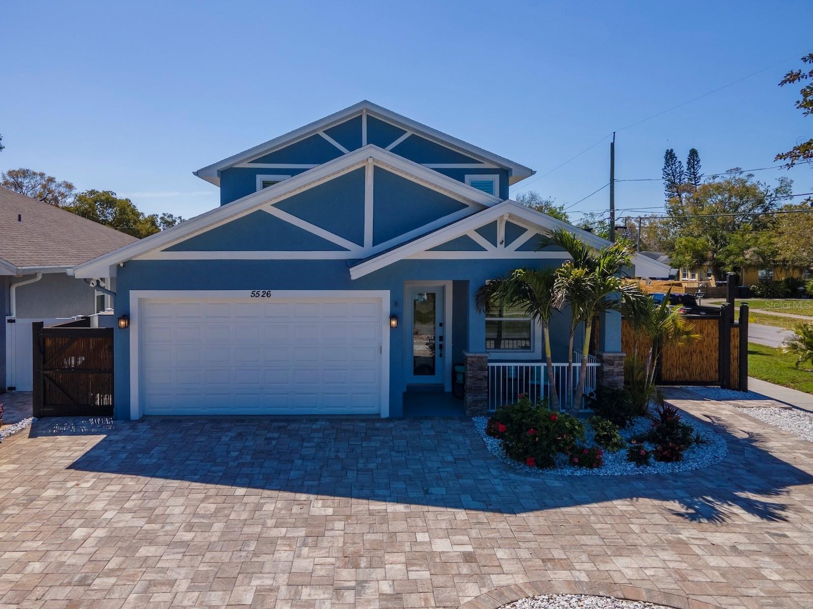 PRICE IMPROVEMENT! LOCATION, LOCATION, LOCATION! This captivating & immaculate Craftsman Style Family home is LOCATED ONLY A 7 MIN BIKE RIDE (1.5 MILES) FROM DOWNTOWN GULFPORT WITH IT'S ECLECTIC ATMOSPHERE, RESTAURANTS, BOUTIQUES & SANDY WATERFRONT BEACH & ONLY 1.5 MILES AWAY FROM STETSON LAW SCHOOL. In addition; it sits on a big corner lot on a low traffic street & is just blocks away from the Gulfport Elementary & Boca Ceiga High School, plus IS IN A NON-FLOOD ZONE, so NO flood insurance required. As you step into the home through the Decorator Stained Glass Front Door you enter into the contemporary living room which sets the stage to the stunning atmosphere of the open concept layout & 10' ceilings that gives the interior an ambiance of sophistication. The Gourmet kitchen has new stainless top of the line appliances & offers an airy expansiveness, it is accented by herringbone backsplash, the counters are Quartzite waterfall in a U-shaped which adds to it's beauty yet efficient workspace. Extra cabinetry has been added under the eat-at counter–offering lots of storage space. As you flow to the big dining room you could easily have a family sized dining table & chairs for entertaining family and friends. From the dining room you exit to the backyard through new hurricane-rated French doors with built in peek-a-boo mini blinds. The low-maintenance, upscale landscaped backyard has newly stained bamboo fencing, offering unique beauty as well as privacy. You will also find a tiki bar with customized countertops & the salt water pool features flowing lighted fountains (a new 3 stage pool pump was installed in 2024) The additional 2 bedrooms are on the 1st floor with lots of character, spacious closet space & are newly carpeted & painted. 2 designer bathrooms are also on the 1st floor. One features a shower over tub with updated tile, the 2nd was completely remodeled & has a new walk-in shower finished in custom floor to ceiling ceramic tile. On the 2nd level is the newly painted & updated Master Ensuite bedroom, it has had new carpet installed & has a sitting area with sliding glass doors (with Custom draperies) that open to a covered balcony overlooking the pool. The huge walk-in closet features custom shelving, floating drawers, a makeup station & has a sliding barn-styled door. There is also a 2nd walk-in closet. The custom walk-in shower has floor to ceiling tile & double shower heads, plus a separate 6’ soaker tub for extra relaxation. The stairway is also carpeted with a new elegant runner. Additional parking has been added at the side of the house complete with remote controlled entry & a large sun shade for RV/boat or truck parking. The 2-car garage is finished with epoxy flooring, new built-in cabinets & customized work bench area. Additional upgrades include; A tankless on-demand hot water system, a whole house water filtration system, new plantation window shutters in all rooms, the homes exterior was completely painted in 2023, a whole house electric surge protection system has been installed, a keyless entry door lock on the magnificent stained-glass decorator front door, flood lights & security cameras are in place in the front & back of the home & all of the landscaping has been upgraded. SOMEONE IS GOING TO BE VERY HAPPY HERE, THAT SOMEONE COULD BE YOU!...just settle in & enjoy this gracefully appointed home, only a Stones throw from the liveliness of the beaches & the downtowns of Gulfport & St. Petersburg!