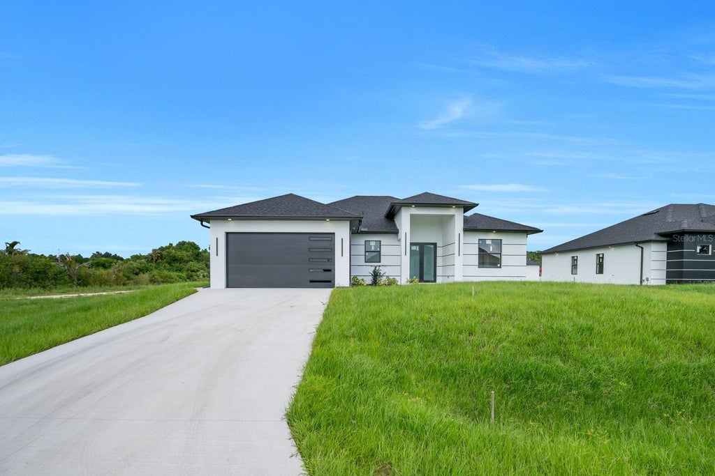 Photo of 3614 6th Street SW, Lehigh Acres, FL 33976 (MLS # A4705598)