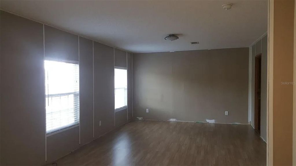 Photo of 151 West Loop, Oak Hill, FL 32759 (MLS # O6378819)