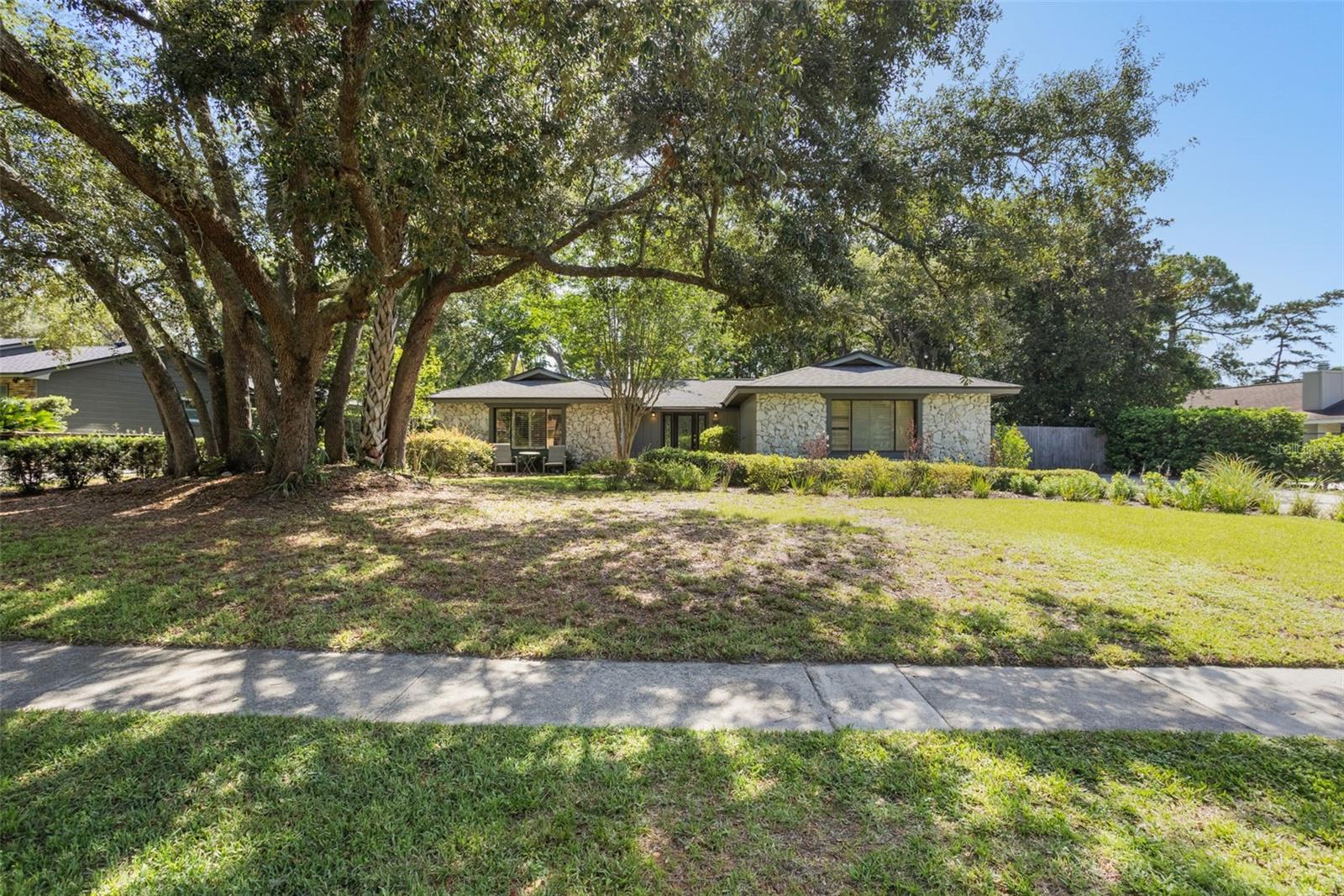 ***Price reduction to $19,000 below the neighborhood average home price!*** Located in the highly desirable Tuscawilla community, this home offers an open floor plan with a blend of tile and wood flooring throughout. The spacious kitchen features striking black galaxy granite countertops and ample cabinet space. Enjoy the outdoors in your fully fenced backyard retreat, complete with mature landscaping, a cozy fire pit area, and plenty of room to relax or entertain. The oversized driveway provides additional parking for guests or recreational vehicles. Rest assured, knowing that the roof was replaced in 2017. This home combines comfort, style, and function in a prime Winter Springs location close to parks, trails, golf, and top-rated schools.